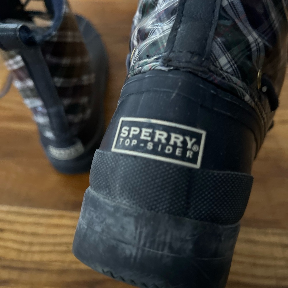 Sperry navy blue water proof boot. Plaid upper with rubber bottom. Size 8